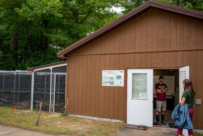 1.Stephanie_greets_zookeeper_at_UMBS_captive_chick-rearing_building